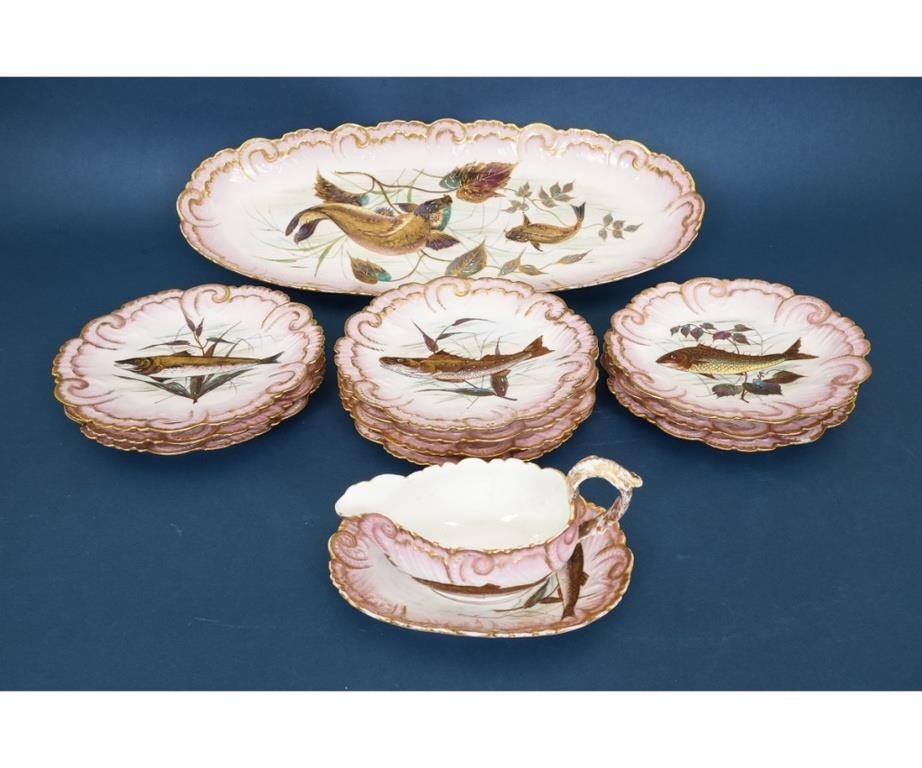 Ten Limoges fish plates; together