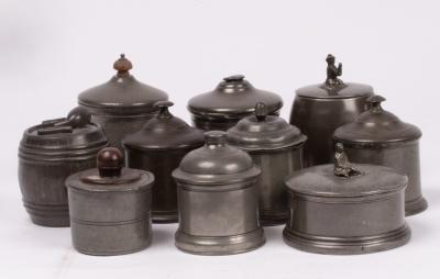 Ten pewter tobacco jars, the