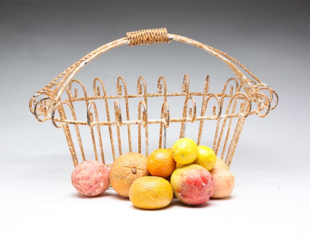 TEN PIECES OF STONE FRUIT IN WIRE