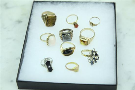 TEN RINGS. Three marked 14k.