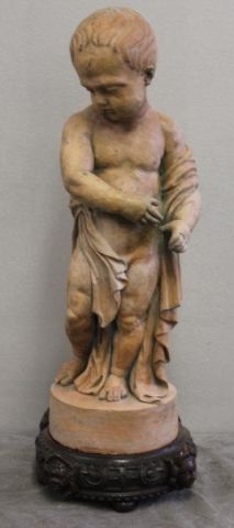 Terracotta Infant on Carved Oak