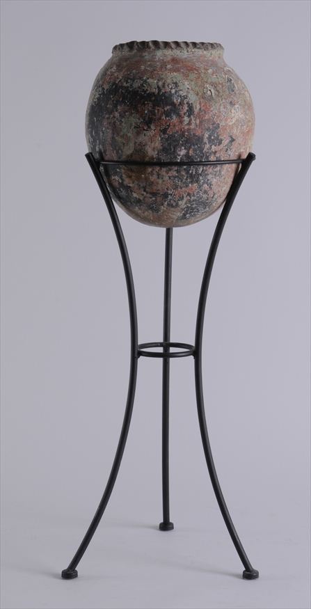 TERRACOTTA JAR ON AN IRON TRIPOD