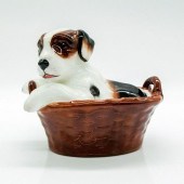 TERRIER SITTING IN BASKET - RO