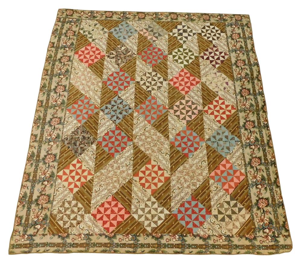 TEXTILE: PIECED CALICO QUILT WITH