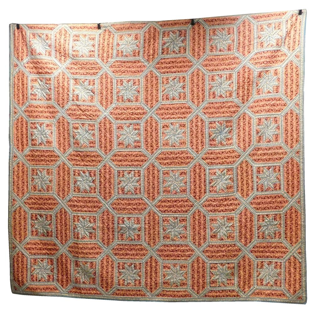 TEXTILE: PIECED COTTON QUILT WITH