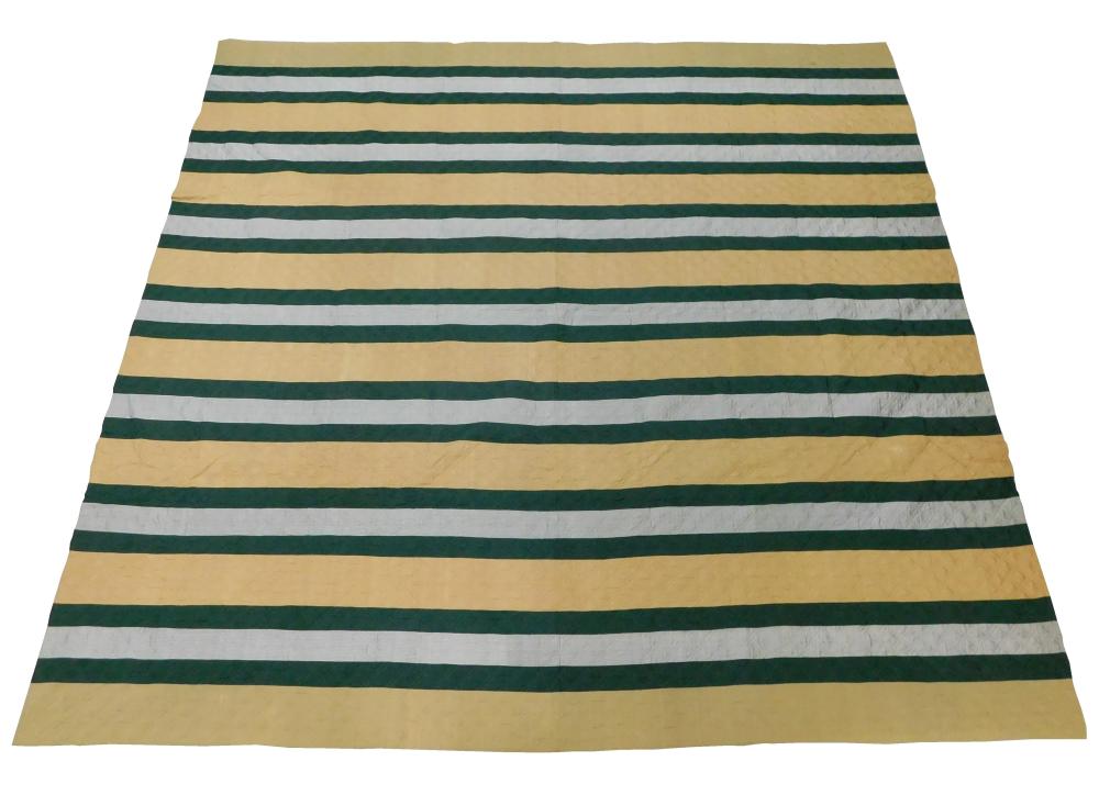 TEXTILE: PIECED QUILT IN STRIPES OF