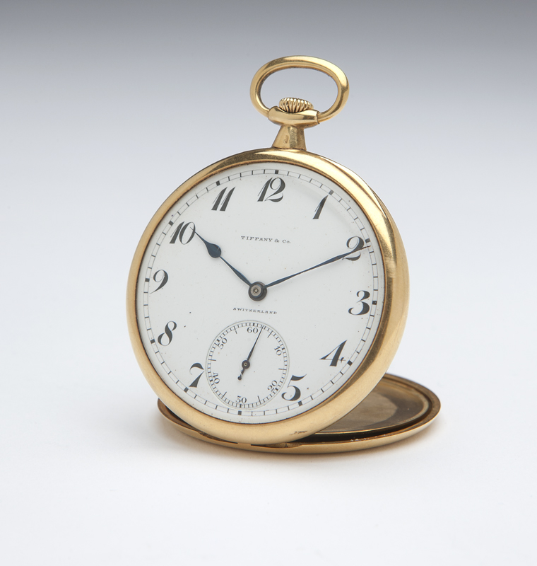 The circular white porcelain dial