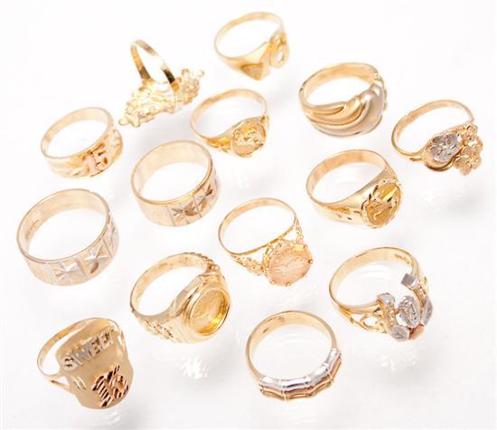 Thirteen 14K yellow gold rings;