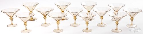 THIRTEEN BLOWN AMBER GLASS