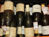 Thirteen bottles including fou
