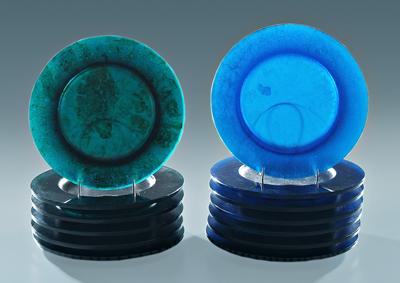 Thirteen cast glass plates: six