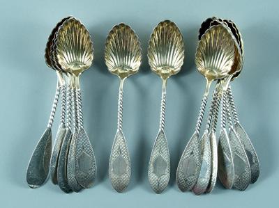 Thirteen coin silver spoons:
