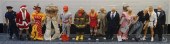THIRTEEN COMPOSITION DOLLS OF