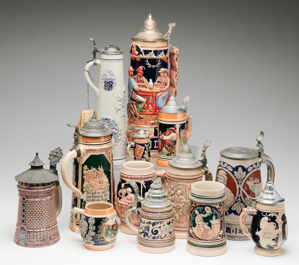 THIRTEEN GERMAN BEER STEINS.