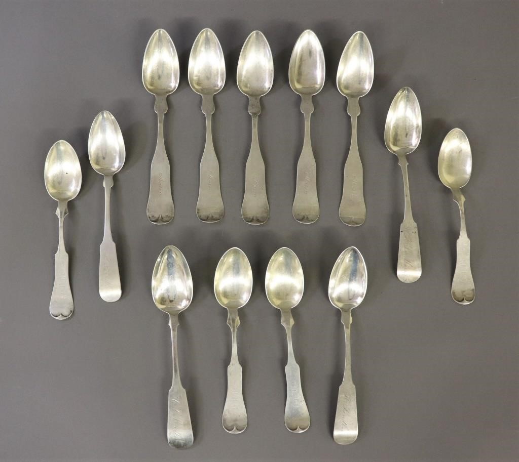 Thirteen large coin silver table