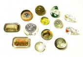 Thirteen paperweights includin