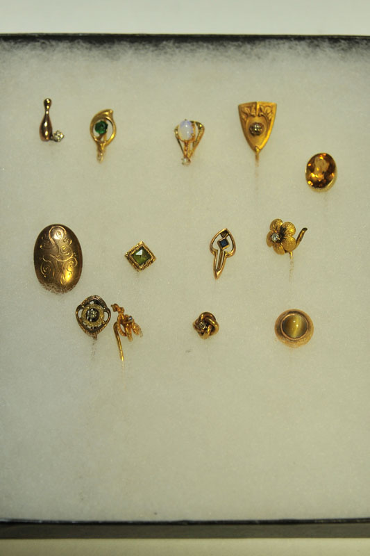 THIRTEEN STICK PINS. Seven marked
