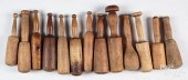 THIRTEEN WOODEN PESTLES AND MA