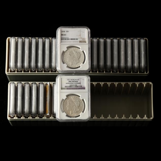 THIRTY (31) GRADED MORGAN SILVER