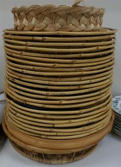 THIRTY-FIVE RATTAN AND WICKER