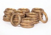 THIRTY PRESSED AND GILT BRASS