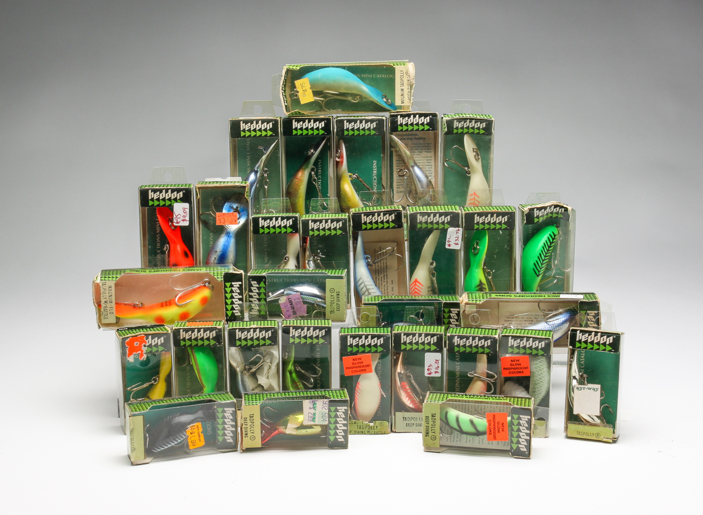 THIRTY-TWO BOXED HEDDON LURES. Late