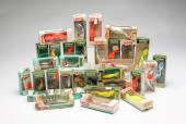 THIRTY-TWO BOXED HEDDON LURES.