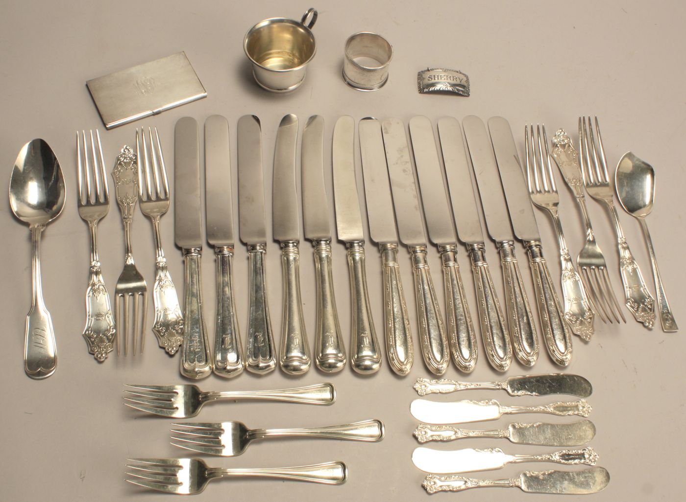 THIRTY-TWO STERLING SILVER AND
