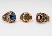 THREE 10 KARAT GOLD CLASS RING