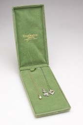 THREE 10K GOLD PENDANTS. Late