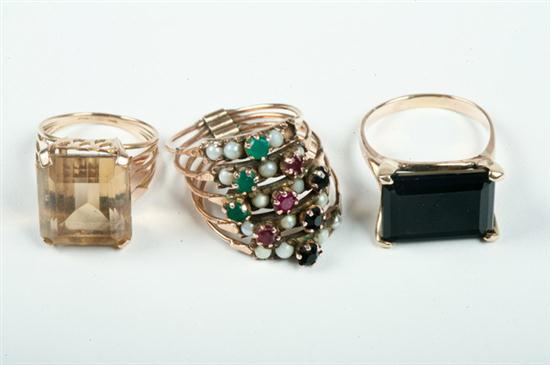 THREE 10K YELLOW GOLD AND COLORED