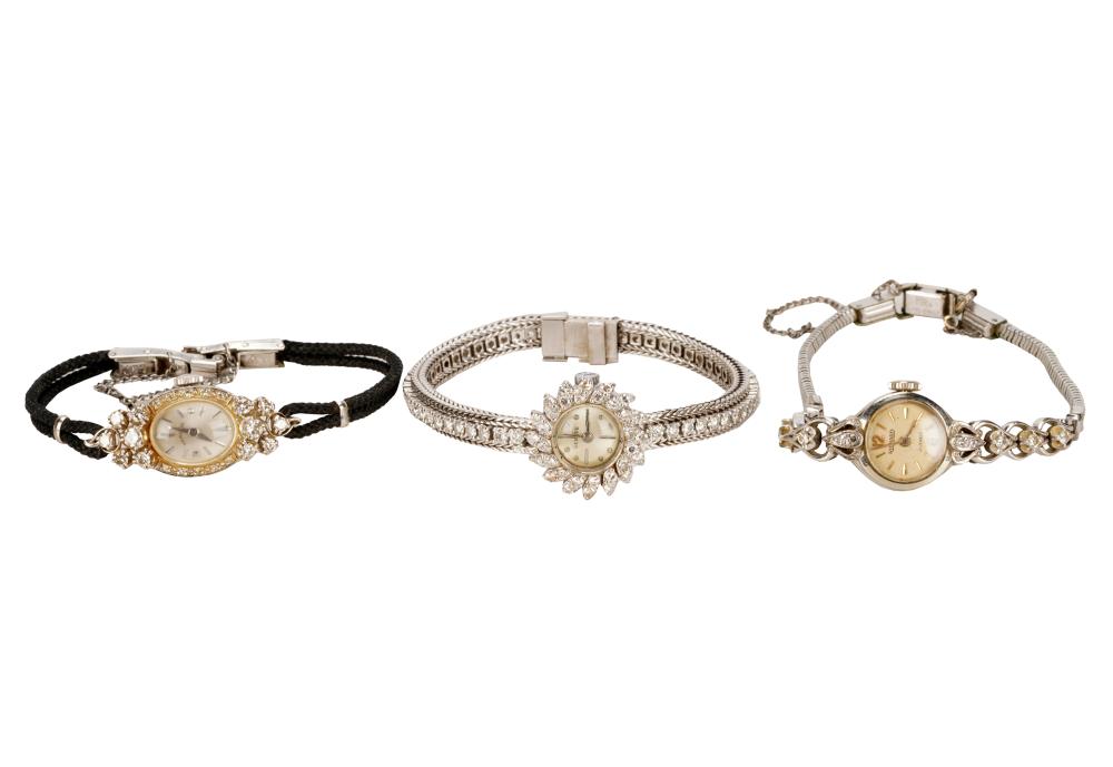 THREE 14 KARAT WHITE GOLD & DIAMOND
