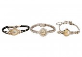 THREE 14 KARAT WHITE GOLD & DI
