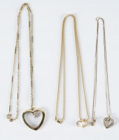 THREE 14 KARAT YELLOW GOLD HEA