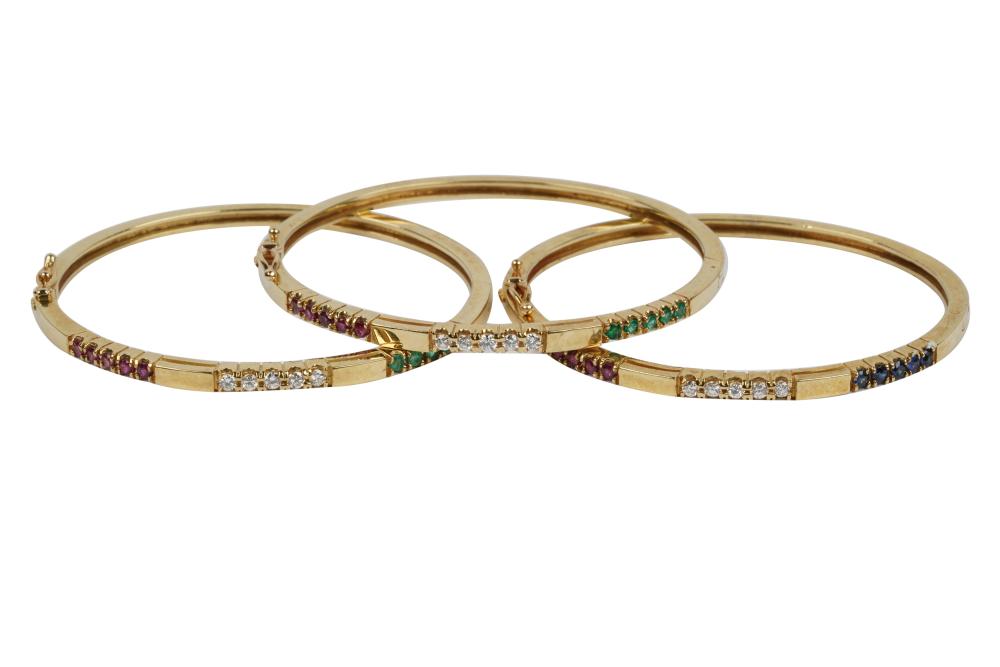 THREE 14 KARAT YELLOW GOLD,