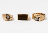 THREE 14 KARAT YELLOW GOLD RIN