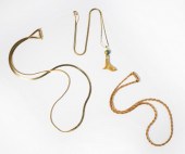THREE 14 KARAT YELLOW GOLD NEC
