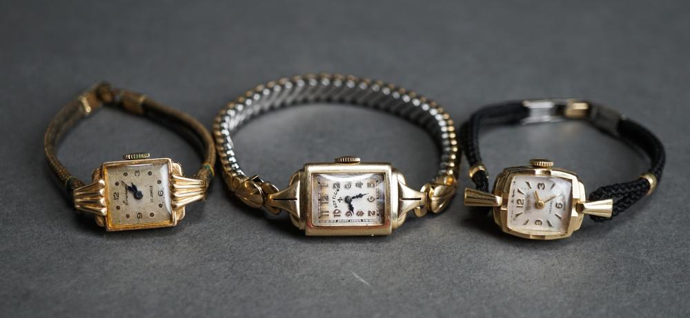 THREE 14-KARAT YELLOW-GOLD CASE