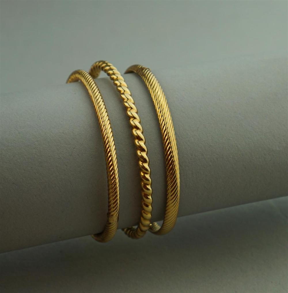 THREE 14K YELLOW BANGLE