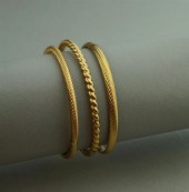 THREE 14K YELLOW BANGLE BRACEL