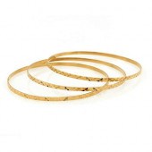 THREE 18K YELLOW GOLD BANGLE B
