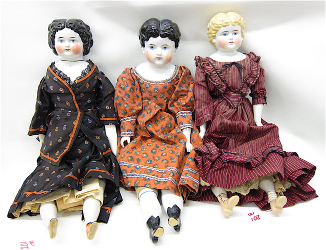THREE 20TH CENTURY CHINA HEAD DOLLS