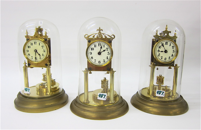 THREE 400-DAY ANNIVERSARY CLOCKS