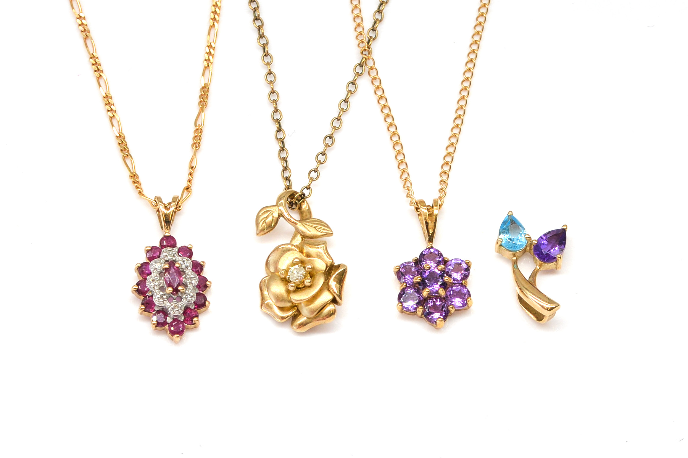 THREE 9CT GOLD AND GEM SET PENDANTS