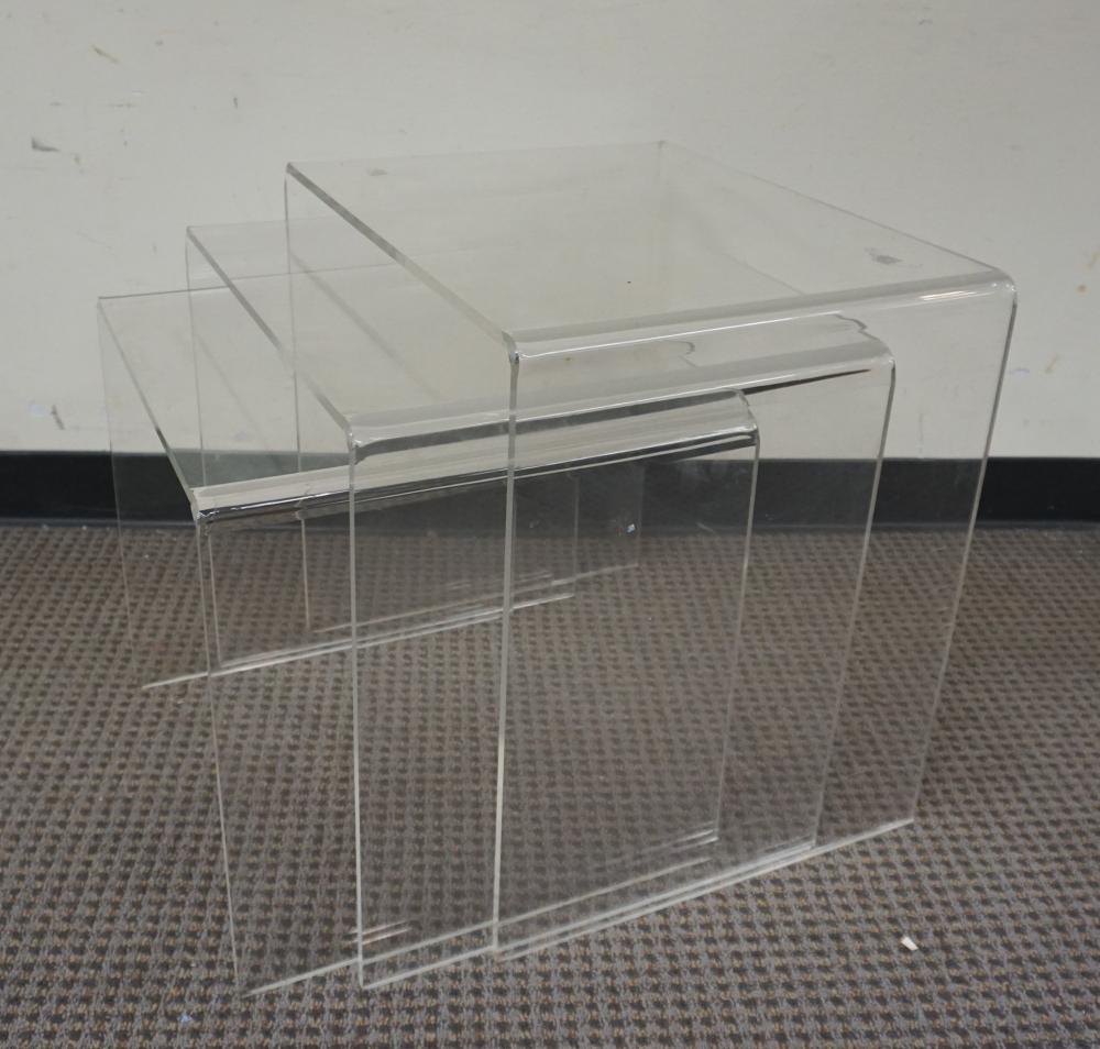 THREE ACRYLIC STACKING SIDE TABLES,
