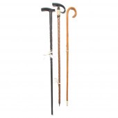 THREE AFRICAN CARVED CANES WIT