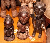Three African carved wood figu