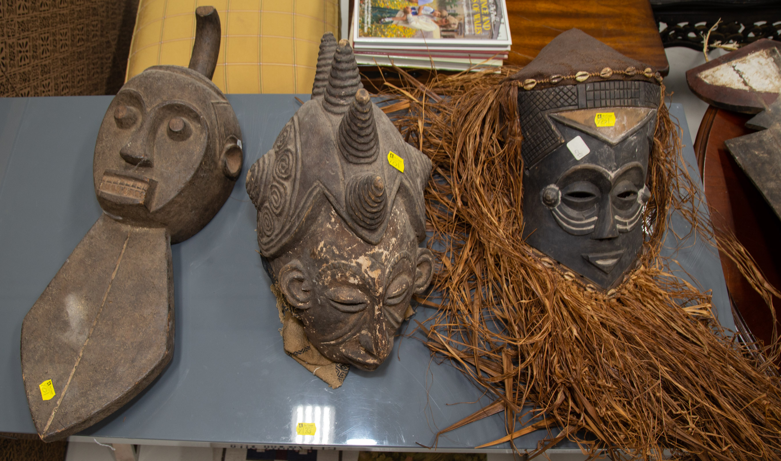 THREE AFRICAN CARVED WOOD MASKS