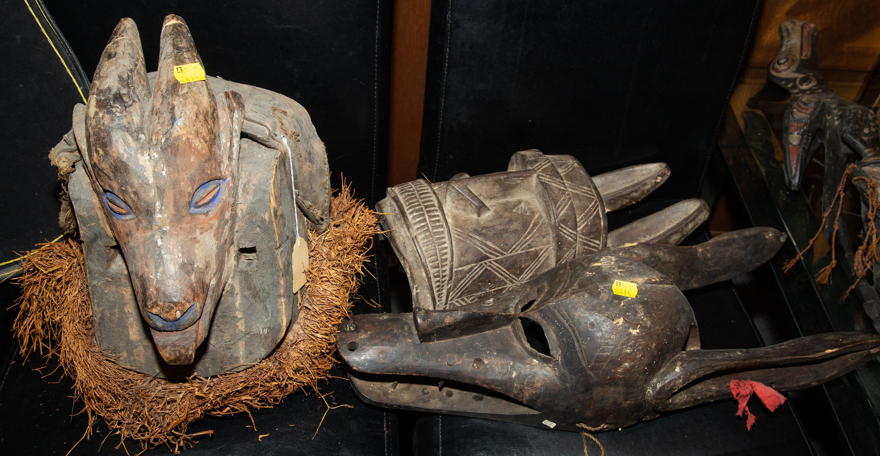 THREE AFRICAN CARVED WOOD MASKS