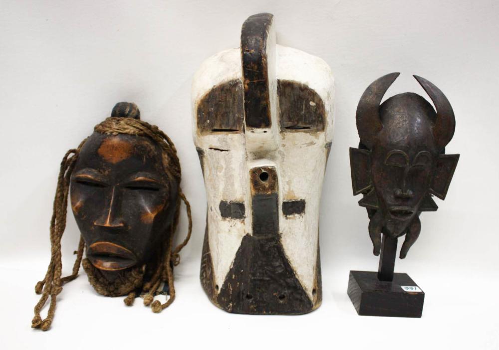 THREE AFRICAN TRIBAL MASKS: 1)